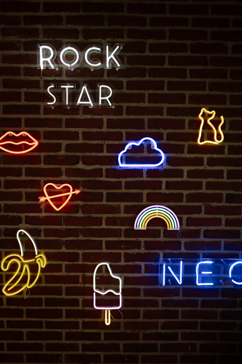  Neon Signs on a Brick Wall